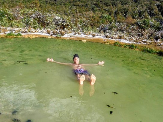 Relaxing in a natural hot pool on a chilly winter’s day