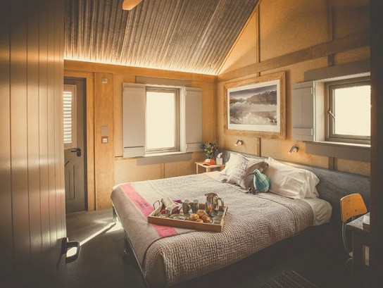 Breakfast is served! Camp Glenorchy cabin bedroom interior.